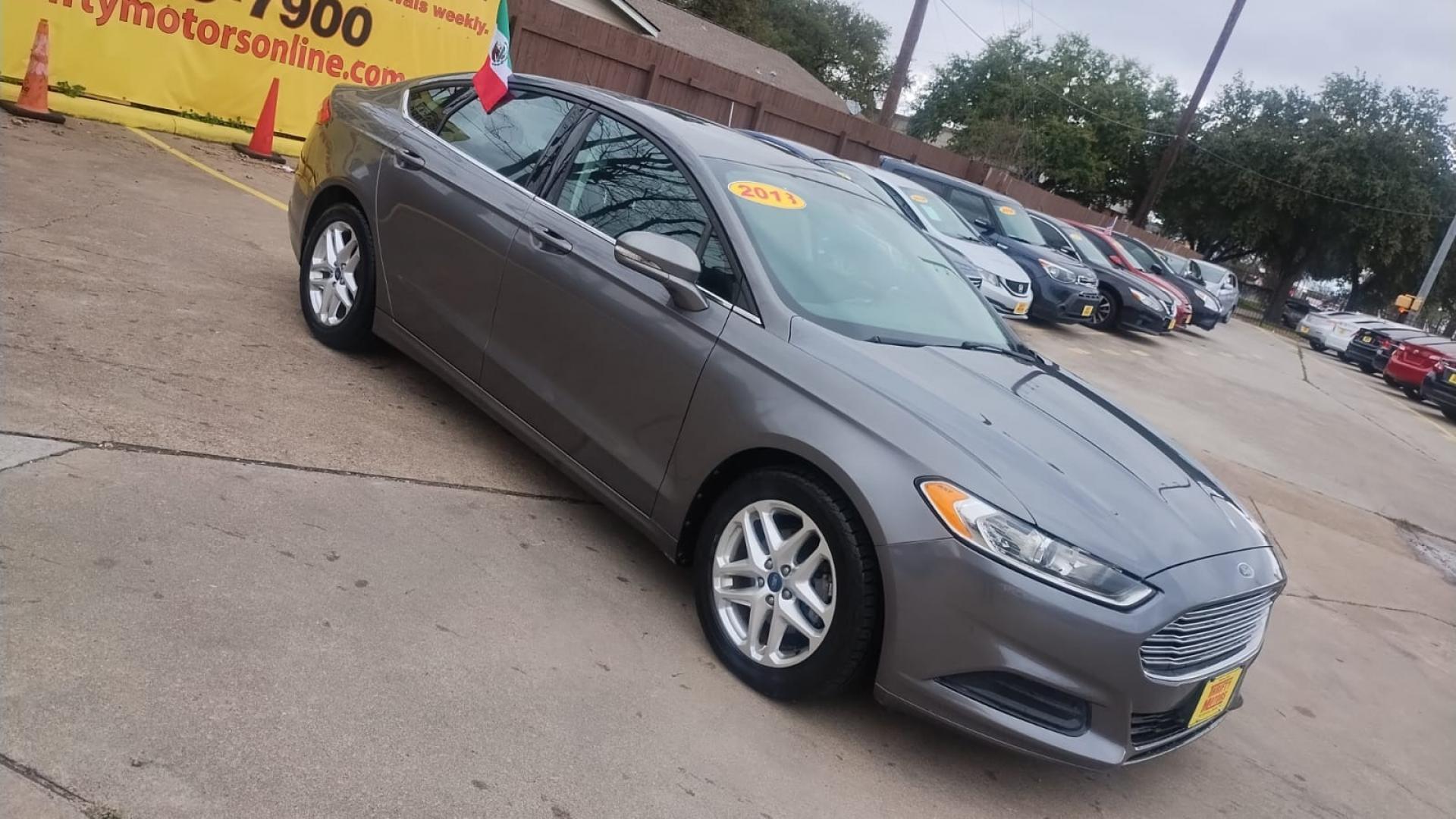 2013 Ford Fusion SE (3FA6P0H78DR) with an 2.5L L4 DOHC 16V engine, located at 16710 Clay Rd., Houston, TX, 77084, (281) 859-7900, 29.834864, -95.656166 - Photo#3
